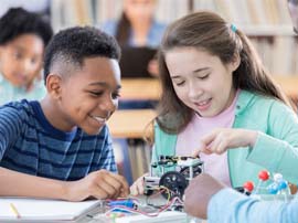  Students building a robot